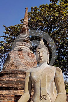 The Buddha statue is located outdoors.