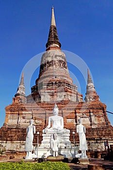 The Buddha statue is located outdoors.