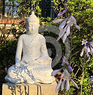 Buddha Statue Meditation in the Garden Peaceful Meditating Sculpture