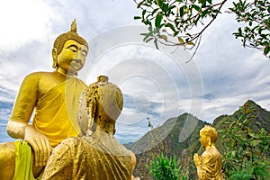 Buddha statue at the mountain of `LerGuaDa` or `Ler Gwa Dor` Tak province, Thailand, Asia. photo