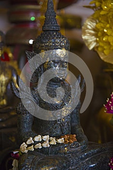 Buddha statue in one of the temples of Thailand.