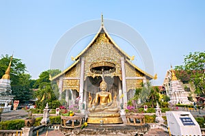 Buddha statue outside the main wiharn at Wat Chedi Luang, Chiang Mai, Thailand