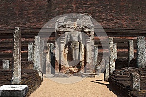 Buddha statue ruins in the ancient city of Polonnaruwa, Sri Lanka. photo