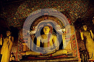 Buddha statue in Dhyana Mudra position in Dambulla photo