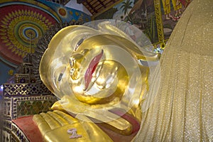 Buddha statue in sleeping style, gold buddha statue