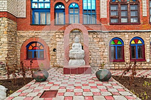 A Buddha statue in temple of all religions. The village of Old Arakchino. Kazan, Tatarstan.