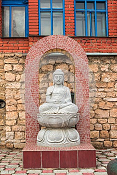 A Buddha statue in temple of all religions. The village of Old Arakchino. Kazan, Tatarstan.