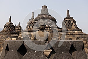 Buddha statue on top of Borobudur temple, Yogyakarta, Java, Indonesia