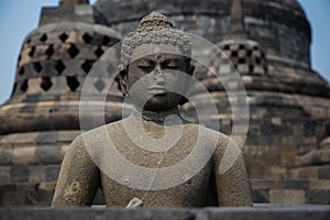 Buddha statue on top of Borobudur temple, Yogyakarta, Java, Indonesia