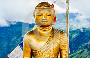 Buddha statue on top of little Adams peak in Ella, Sri Lanka