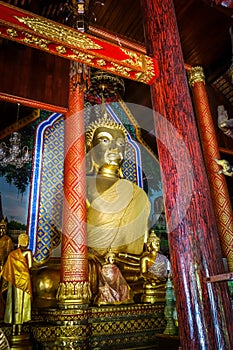 Buddha statue in Wat Chomphu temple, Chiang Mai, Thailand