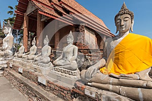 Buddha statue in Wat Yai Chai Mongkol temple. Ayutthaya Historical Park, Thailand. UNESCO World Heritage Site.