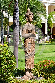 Buddha statue in zen garden environment