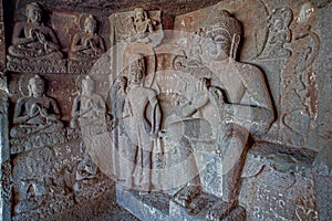 Buddha statues in cave temple hinyana Pandav caves first century BC photo