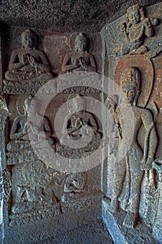 Buddha statues in cave temple hinyana Pandav caves first century BC photo