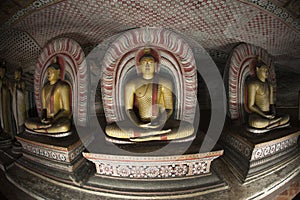 Buddha Statues at Dambulla Rock Temple, Sri Lanka photo