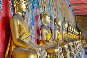 Buddha statues at the ordination hall. Wat Arun. Bangkok. Thailand