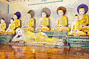Buddha statues in the Shwedagon pagode in Yangon Myanmar photo