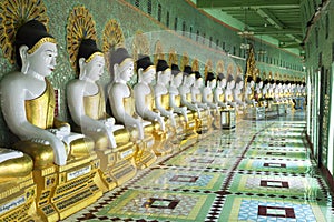 Buddha Statues at U Min Thonze Pagoda in Sagaing, Mandalay, Myanmar photo