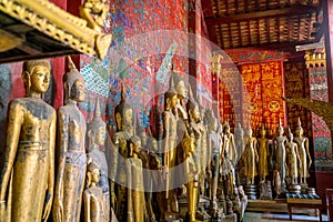 Buddha statues in Wat Xieng Thong in Luang Prabang