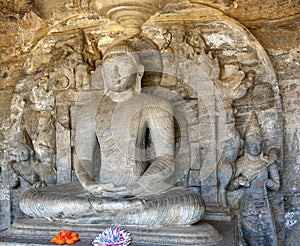 A Buddha stone carving at Gal Vihara at ancient Polonnaruwa in Sri Lanka.