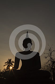 Buddha in Sukhothai sunset