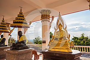 Buddha in a temple at evening sunset background.Thailand photo