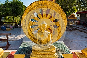 Buddha in a temple at evening sunset background.Thailand photo