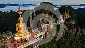 Buddha on the top Mountain of Wat Tham Seua Tiger Cae , Krabi,Thailand