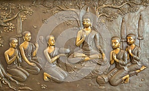 Buddha wooden carving.Mural paintings tell the story about the Buddha`s history