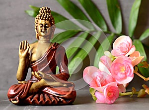 Buddha in ZEN garden with flower