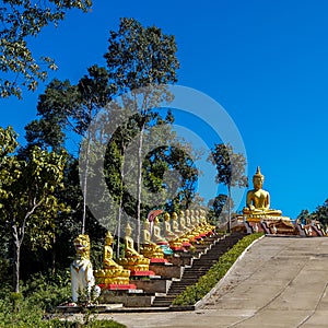 Buddhas at the stairs to Wat Hua Lang Northern Thailand