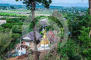 Buddhism building with rice field in Chiang Rai province