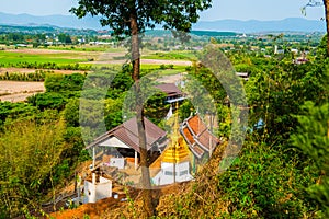 Buddhism building with rice field in Chiang Rai province