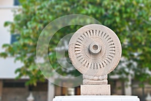 Buddhism wheel with stone