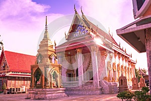 Buddhist big hall and small pagoda in evening at Wat Sakae, Thai temple which one of the attractions in Thailand.