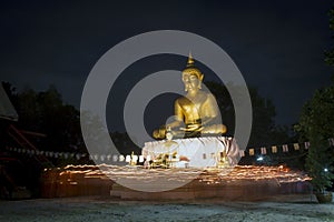 Buddhist came to celebrate with candle