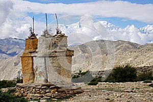 Buddhist chortens against the background of the Annapurna snow massif in the Himalayan mountains.