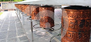 Buddhist Copper prayer drum Sarnath close up