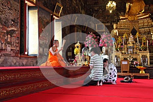 Buddhist devotees at Wat Arun temple