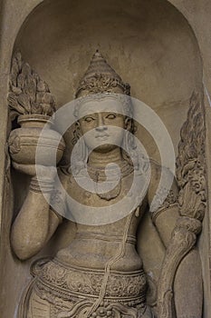 Buddhist Dvarapala Guardian Sculpture Flanking Entrance to Image House photo
