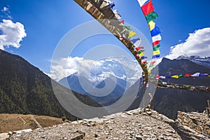 Buddhist flags. Annapurna circuit trek. Himalayan mountains, Nepal