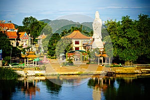 Buddhist goddess of mercy. Statue in chinese temple near river k