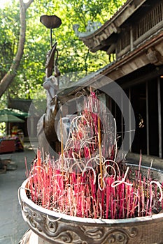 Buddhist Incense Burning infront of a Vietnamese Buddhist Temple