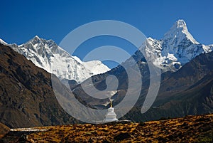 Buddhist Khumjung Stupa, Lhotse Peak and Ama Dablam Peak in Nepal