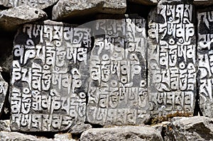 Buddhist mani stones with sacred mantras in Tengboche,Nepal