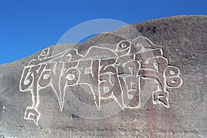 Buddhist mantra on the stone.