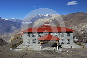 Buddhist Monastery Building Exterior Red Roof Grey Facade Himalaya Mountains Muktinath Nepal