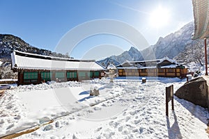 Buddhist monastery among the snowy forest in the winter taiga. Beautiful and uninhabited