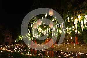 buddhist monk floating hot air balloon in Yeepeng and Loy Krathong festival